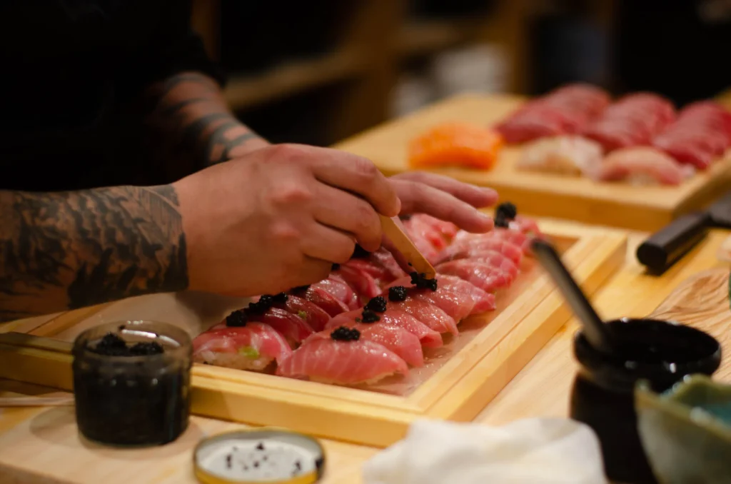 sushi omakase in omakase box otoro nigiri caviar on top